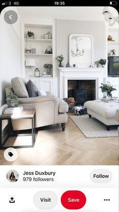 a living room filled with furniture and a fire place