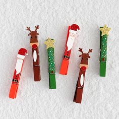 christmas decorations made out of toothbrushes in the snow