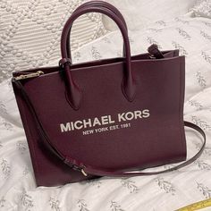 Michael Kors Medium Mirella Monogram Handbag Tote Genuine Pebble Leather Nwot Like New No Obvious Wear No Marks No Damage Pristine! Inside Is Also Pristine Comes With Longer Strap 1 Zipper Pocket Inside Accepting Offers! Top Rated Seller! Smoke Free Clean Home Quickly Shipped With Love Luxury Bags With Logo For On-the-go, Luxury Logo Bags For On-the-go, Luxury Purple Rectangular Bag, Chic Michael Kors Bag With Logo, Michael Kors Top Handle Shoulder Bag With Logo, Crossbody Shopping Bag With Logo, Logo Satchel For Shopping, Luxury Logo Satchel For Shopping, Purple Bag With Detachable Handle