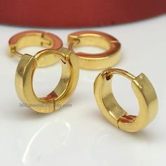 Men's solid 14K gold hoop earrings. These extra small square edged hoop earrings are great for the upper ear, second hole, and cartilage piercings. SPECIFICATION Base metal: 14K Real Yellow Gold with inner hallmark stamp Inner Diameter : 6.5mm, Extra Small Outer Diameter: 9mm Approximate width: 2.4mm Ear post gauge: 20g, normal piercing Measurements are an approximation Thanks for your interest in our 14K solid gold squared edge hoop earrings. Modern Small Hoop Gold Piercings, Modern Gold Small Hoop Piercings, Classic Small Hoop Gold Piercings, Gold Small Hoop Classic Piercings, Classic Gold Small Hoop Piercings, Classic Gold Internally Threaded Huggie Earrings, Helix Hoop Earring, Earrings Small Hoop, Earrings Cartilage