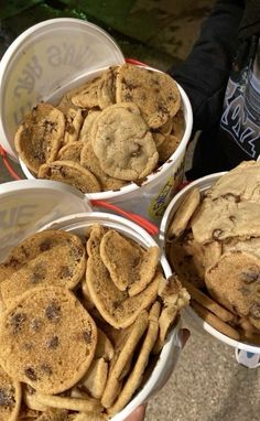 three buckets filled with chocolate chip cookies