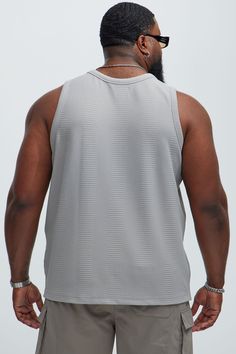 Available In Grey, Sage and Taupe Scoop Neck Sleeveless Textured Detail 95% Polyester 5% Spandex Imported | Mens Angelo Textured Tank in Grey size Large by Fashion Nova Moisture-wicking Sleeveless Tank Top, Solid Moisture-wicking Sleeveless Vest, Gray Summer Vest For Gym, Gray Summer Gym Vest, Summer Gym Vest In Gray, Gray Sleeveless Tank Top For Gym, Gray Sleeveless Tops For Gym, Gray Sleeveless Gym Top, Gray Sleeveless Tank Top For Workout