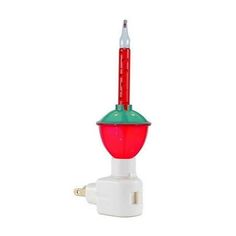 a red and green light on top of a white plug with a toothbrush sticking out of it