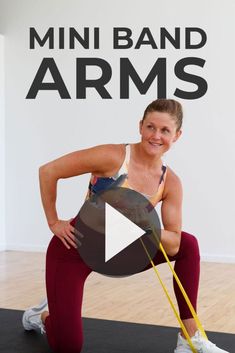 a woman is standing on a yoga mat with her arms behind her back