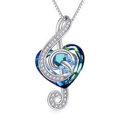 Discover the elegance of our Sterling Silver Crystal Pendant Necklace, a stunning piece where a blue heart meets a sparkling music symbol, designed exclusively for women and plated with luxurious white gold. Crafted from premium sterling silver, this enchanting necklace features a radiant blue heart adorned with crystals, paired with an elegant music symbol, perfect for women who appreciate both beauty and melody. The white gold plating adds a touch of sophistication, ensuring that this piece no Music Note Jewelry, Treble Clef Necklace, Necklace Music, Butterfly Beautiful, Music Symbol, Music Heart, Crystal Heart Pendant, Jewelry Accessories Ideas, Treble Clef