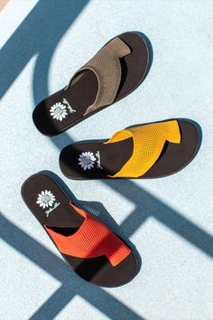 Who knew flip-flops could be so fun and modern? Our signature comfort-driven footbed is paired with a fresh new asymmetrical design that'll sure to be the envy of trendsetters everywhere Comfortable Yellow Summer Flip Flops, Trendy Yellow Synthetic Flip Flops, Playful Non-slip Open Toe Flip Flops, Yellow Cushioned Synthetic Flip Flops, Yellow Synthetic Flat Flip Flops, Asymmetrical Design, Trend Setter, Flip Flops, Heel Height