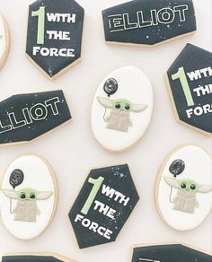 cookies decorated with star wars characters and the number one for each force, are on display