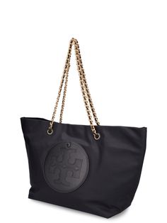 Find TORY BURCH Ella Chain Nylon Tote Bag on Editorialist. Height: 29cm Width: 32cm Depth: 16cm. Handle drop: 23cm. Double top handles. Front logo detail. One front snap button pocket Ysl Lip, Cult Gaia Bag, Tods Bag, Tory Burch Ella, Nylon Tote Bag, Tory Burch Dress, Tory Burch Tote, Tory Burch Bag Totes, Nylon Tote Bags