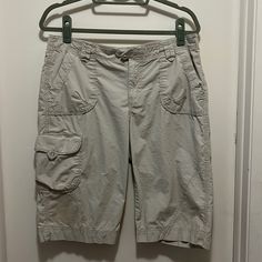 Long Khaki Cargo Shorts; Great For Hiking Size 10 See Photos For Signs Of Wear As There Are 2 Slight Stains Near Bottom Of Each Leg. Never Worn! Questions? Leave A Comment Below! Casual Capri Length Bottoms For Outdoor, Capri Length Bottoms With Pockets For Outdoor Activities, Spring Pants For Outdoor Activities, Short Length, Sporty Outdoor Capris With Pockets, Short Pants For Outdoor Activities In Spring, Casual Short Capris With Pockets, Casual Short Length Capris With Pockets, Casual Short-length Capris With Pockets, Casual Outdoor Cotton Capris