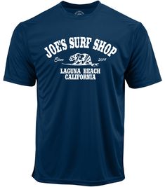 The Joe's Surf Shop California Graphic Workout Tee is an essential addition to your workout clothing collection. This moisture wicking tee is made of the softest polyester that gives you an ultra comfortable feel. Our best selling Fins Up logo was designed in Laguna Beach, CA. 3.8-ounce, 100% polyester Moisture wicking Lightweight and breathable Set-in sleeves Free shipping on orders $65+ Navy Sports T-shirt With Letter Print, Team Name Dri-fit Short Sleeve T-shirt, Dri-fit T-shirt With Team Name, Dri-fit Team Name T-shirt, Navy Sporty T-shirt Pre-shrunk, Sporty Navy Pre-shrunk T-shirt, Navy Moisture-wicking Tops For Sports Season, Navy Sports T-shirt With Team Name, Dri-fit Short Sleeve T-shirt With Letter Print