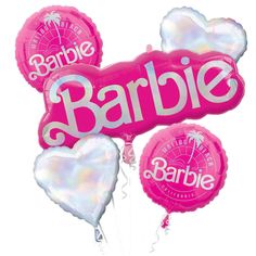 some pink and white balloons with the word barbie on them