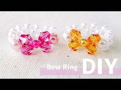 two bows are sitting next to each other on a white surface with the words bow ring diy