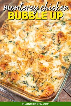 a casserole dish with cheese and spinach in it on a wooden table