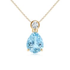 Secured in a prong setting, the pear aquamarine is the focal point of this pendant. For a dash of sparkle, the cool-blue gem is topped by a bezel-set round diamond. This stunner is designed in 14k yellow gold. Aquamarine Pendant, Bezel Set Diamond, Trendy Collection, Blue Gems, Jewel Box, Bezel Setting, 18k Rose Gold, Round Diamond, Prong Setting