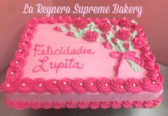 a birthday cake with pink frosting and roses on it that reads, la regera supreme bakery