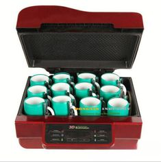 a red case filled with lots of teal colored coffee mugs on top of a white table