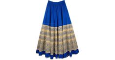 Blue Cotton Crisp Long Skirt - This is a very crisp and long summer long skirt in a tory blue color with Indian khaki panel and a floral block print. A wide full long skirt with a lot of cloth to go around. The high quality long cotton skirt has an elastic waist for flexibility and is half lined. The hemline is accentuated by a golden ribbon. This skirt surely looks beautiful with its golden highlights and the contrast color pattern. Length: 38.5" ; Waist: 26"-34" ; Material: 100% Cotton, half l Traditional Blue Cotton Skirt, Traditional Blue Maxi Skirt, Traditional Blue Flowy Maxi Skirt, Traditional Blue Lined Skirt, Traditional Long Blue Skirt, Blue Cotton Maxi Skirt, Traditional Blue Flowy Skirt, Traditional Flowy Blue Skirt, Long Summer Skirt