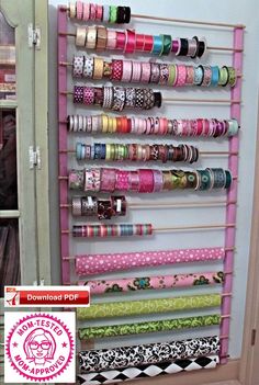 there is a rack with many different ribbons on it