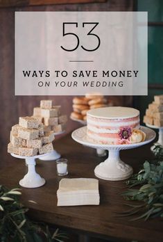 a table topped with cakes and desserts on top of it