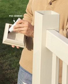 a man is opening the door to his house with an empty box in front of him