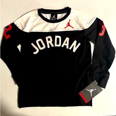 Jordan Boys Size 6/7 Long Sleeve Super Cute New Sporty Black Shirt For College, Sporty Long Sleeve Shirt With Letter Print, Letter Print Tops For College, Black Long Sleeve Sports Shirt, Jordan T Shirts Men, Jordan Shirt, Kids Jordan Shirt, Jordan Boys, Jordan Shirts