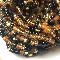 Brown Skin Waist Beads Black Brown and Golden Waist Beads | Etsy Cheap Gold Waist Beads For Festivals, Gold Waist Beads With Colorful Beads For Festivals, Black And Gold Waist Beads, Brown Waist Beads, Spiritual Gold Beaded Waist Beads, Adjustable Multicolor Gold Waist Beads, Filler Pics, Waist Beads African, African Waist Beads