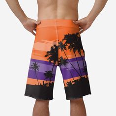 Ride off into the sunset of style by rocking these Clemson Tigers Sunset Boardshorts all spring and summer long! Features Team-colored, tropical design with sunset pattern and palm tree silhouette accents for some huge vacation vibes Team logo display on left leg, in case there were any doubts where your allegiances lie Faded team logo display on upper right leg for a little extra team spirit Adjustable drawstring, because the only thing worse than losing a big game is losing your shorts Details Palm Tree Silhouette, Logo Display, Vacation Vibes, Clemson Tigers, Tennessee Volunteers, Tropical Design, Tree Silhouette, Cincinnati Bengals, Big Game