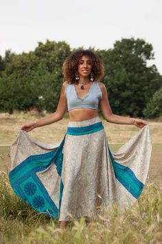 Cool, breezy upcycled sari skirtwith a retro vibe. Made of beautiful light fabric that's great for summertime lounging. It flows and floats as you walk, a very elegant and feminine skirt.  SIZE  ONE SIZE:  Waistband = 28-36" (71-91.5 cm) Length = 36" (91.5 cm) THIS LISTING IS FOR CREAMAQUA Also available in other colours, please check our listings. Code: DRAGONFLY SKIRT (SDDFLY) Traditional Summer Flowy Maxi Skirt, Hippie Festival Skirt, Traditional Summer Beach Wrap Skirt, Bohemian Summer Festival Wrap Skirt, Bohemian Harem Skirt For Festivals, Bohemian Long Skirt For Festival, Traditional Summer Maxi Skirt With Lining, Hippie Long Wrap Skirt For Summer, Summer Festival Harem Skirt