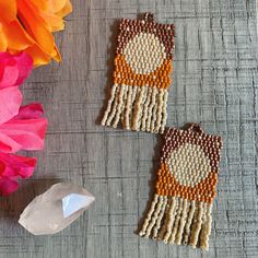 Inspired by beautiful handwoven Oaxacan rugs. Artisan Handwoven Orange Earrings, Artisan Orange Handwoven Earrings, Traditional Brown Handwoven Beaded Earrings, Traditional Brown Handwoven Earrings, Traditional Handwoven Brown Earrings, Traditional Brown Beaded Fringe Earrings, Handwoven Orange Bohemian Earrings, Oaxacan Rugs, Textile Earrings