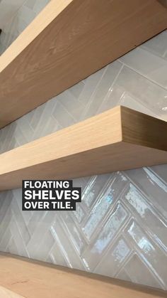 some shelves that are made out of plywood and wood with the words floating shelves over tile