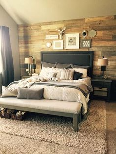 a large bed sitting in a bedroom on top of a carpeted floor next to a window