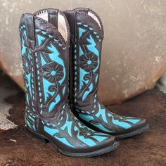 Lane Boots Ladies Hand-Crafted Cowboy Western Boots, Style Name Poison. Made From Dark Espresso Brown Leather, These Boots Feature Intricate Floral Detailing, Bright Turquoise Leather Underlay And Dramatic Turquoise Leather Buckstitch Detail. Dark Espresso Brown Leather Whipstitch Detail All Along Collar. Snip Toes, 1.5" Riding Style Stacked Leather Heel, 13" Mid-Calf Shaft Height, 14.5" Calf Circumference, A Comfortable Padded Leather Footbed, Fully Leather Lined, Leather Pull Tabs And Are Finished With A Painted Turquoise Leather Outsole. Handmade In Mexico Of The Finest Quality Materials. This Particular Style & Color Combination Is No Longer Made By Lane Boots. Hard To Find. Stunning Snip Toe Cowgirl Boots, Lane Boots, Floral Overlay, Bright Turquoise, Boots Style, Espresso Brown, Turquoise Leather, Cowboy Western, Western Cowboy Boots