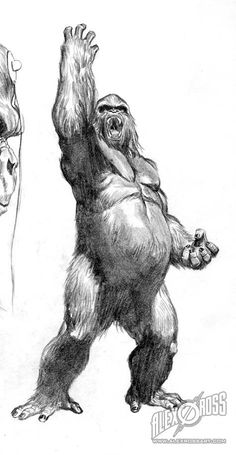 two gorillas standing next to each other with their hands in the air and one holding something