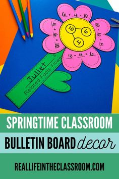 the springtime classroom bulletin board is decorated with paper flowers and pencils to help students learn