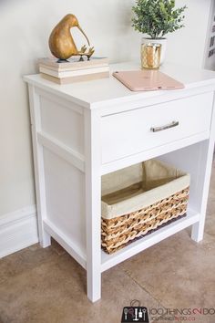 a white nightstand with wicker baskets underneath it and text overlay that reads diy nightstand