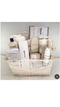 a white basket filled with lots of items