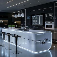 a modern kitchen with black and white decor