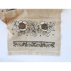 a piece of cloth with flowers on it