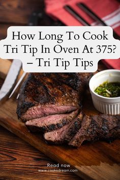 a steak on a cutting board with a small bowl of sauce