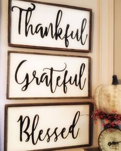 three wooden signs that say grateful and grateful