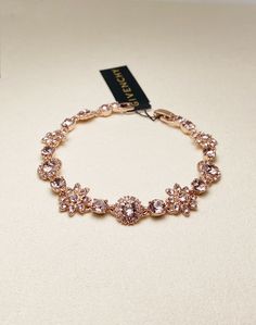 "Accent your look with the sparkling garden of crystal flowers Set in Rose gold-tone mixed metal Approx. length: 7-1/2\" Foldover clasp closure" Givenchy Bracelet, Pave Bangle, Crystal Flowers, Desired Reality, Vintage Givenchy, Cluster Necklace, Fancy Jewellery, Jewelry Lookbook, Gorgeous Bracelet