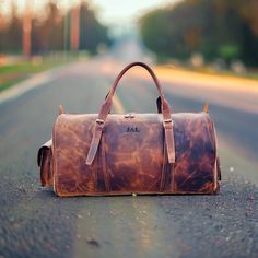 Adeeva Leather  Special offer Flat 70% Off With Free Shipping  ✍✍Free Personalization  Free Gift Wrapping Free Shipping ◼ Rustic Brown Elegance: Embrace the charm of rustic brown with this exquisite leather duffel bag. Its warm tones and natural appeal add a touch of timeless elegance to your travel gear. ◼ Handcrafted with Love: Each duffel bag is meticulously handcrafted with love and attention to detail. This artisanal touch ensures a unique and one-of-a-kind piece for your journeys. ◼ Advent Vintage Bags With Waxed Finish As Gift, Vintage Waxed Finish Bag As Gift, Vintage Waxed Finish Bag For Gift, Large Leather Travel Bag Ideal As Gift, Leather Travel Bag As A Gift, Brown Leather Travel Bag For Gift, Leather Travel Bag With Luggage Sleeve As Gift, Brown Leather Travel Bag As Gift, Classic Leather Travel Bag As Gift