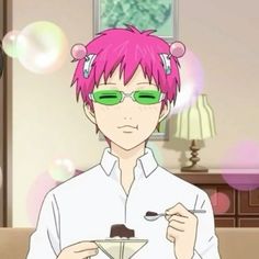 a man with pink hair and green glasses holding a spoon