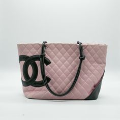 General: Brand: Chanel Design: Type: Handbag, Tote bag Material: Leather Color: Baby pink Hardware Color: Silver Gender: Women Size: Size (HxWxD): 24.5cm x 29.5cm x 14cm / 9.64'' x 11.61'' x 5.51'' Included Items: Accessories: card Accessories Notice: Before purchasing, please refer to the images of the accessories included with the item. Condition: Condition: Used (good) Ranking: Rank AB Used - Traces of usage, scratches / dirt can be seen but generally in good condition Seller Ranking: Rank AB Luxury Large Capacity Pink Shoulder Bag, Luxury Pink Shoulder Bag For Travel, Designer Pink Bag With Dust Bag, Designer Pink Bags With Dust Bag, Luxury Pink Shoulder Bag With Removable Pouch, Designer Pink Bags For Travel, Luxury Pink Coated Canvas Bag, Pink Shoulder Bag With Top Carry Handle For Shopping, Luxury Pink Coated Canvas Shoulder Bag