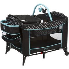 a baby crib that is black and blue