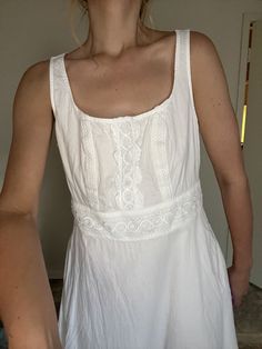 the perfect white dress for summer does exist and of course- it's a Y2K jcrew number, truly a beautiful piece; white gauzey like fabrication and lace/crochet details throughout, fully lined and zip closure up the back; sleeveless with a scoop neckline; empire waist; hem hits ankle area so a true maxi length; tag reads a size M and fits true to size; for reference, model is 5"5, 34B cup size, pear shaped, and typically wears a size Small or Medium  in tops or dresses (size 2/4) so this is just a relaxed fit on her!  measurements: neck- 10 inches shoulder seam to shoulder seam: 12 1/2 inches  arm pit to arm pit: 18 1/2 inches waist- 16 inches hip- 20 inches shoulder seam to bottom hem: 46 1/2 inches Please note that each listing is a vintage item and does range anywhere from 15-40+ years old White Dress For Summer, White Dress Long, Vintage Cottage Core, Find Style, Ankle Length Dress, Dress For Summer, Vintage Cottage, Fit Ideas, Lace Crochet