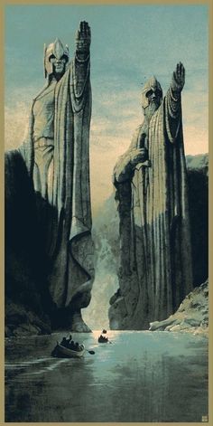 two large statues standing next to each other in front of a body of water with mountains behind them