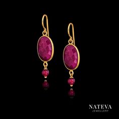 Gold-plated silver 925 earrings, each set with a stunning ruby stone. Their deep colour and texture, enhanced by the gold plating, make them a unique and luxurious addition to any jewellery collection. The earrings also feature a smaller round ruby bead set under each Ruby stone, adding an extra touch of elegance. Materials: 925 Silver Gold Plating Ruby Size (approx.): 39 mm length, 15x10 mm gemstone Please note: This photo is for illustrative purposes only, each piece of jewellery is uniquely one-of-a-kind and made to order therefore the size, texture and forms will slightly vary. CARING FOR SILVER Silver jewellery will naturally tarnish (oxidise) over time depending on exposure to extreme temperatures, humidity, sunlight, chemicals and other factors. Tarnishing is a dulling which natural Luxury Ruby Gemstone Earrings, Luxury Hallmarked Ruby Earrings, Gold Faceted Ruby Earrings, Elegant Ruby Jewelry With Natural Stones, Gold Ruby Gemstone Earrings, Gold Earrings With Ruby Gemstone, Gold Ruby Earrings With Gemstone, Clear Nail Polish, Ruby Beads