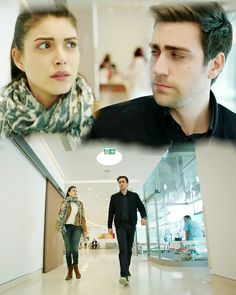 a man and woman walking down an escalator in a shopping mall, one is looking at the camera