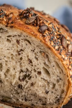 a loaf of bread with seeds on it